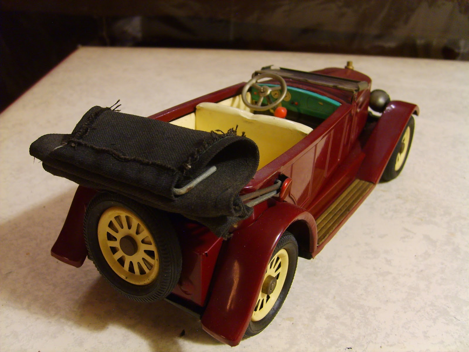 Toy car with steering wheel on roof sales